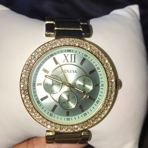 Gold watch with crystals